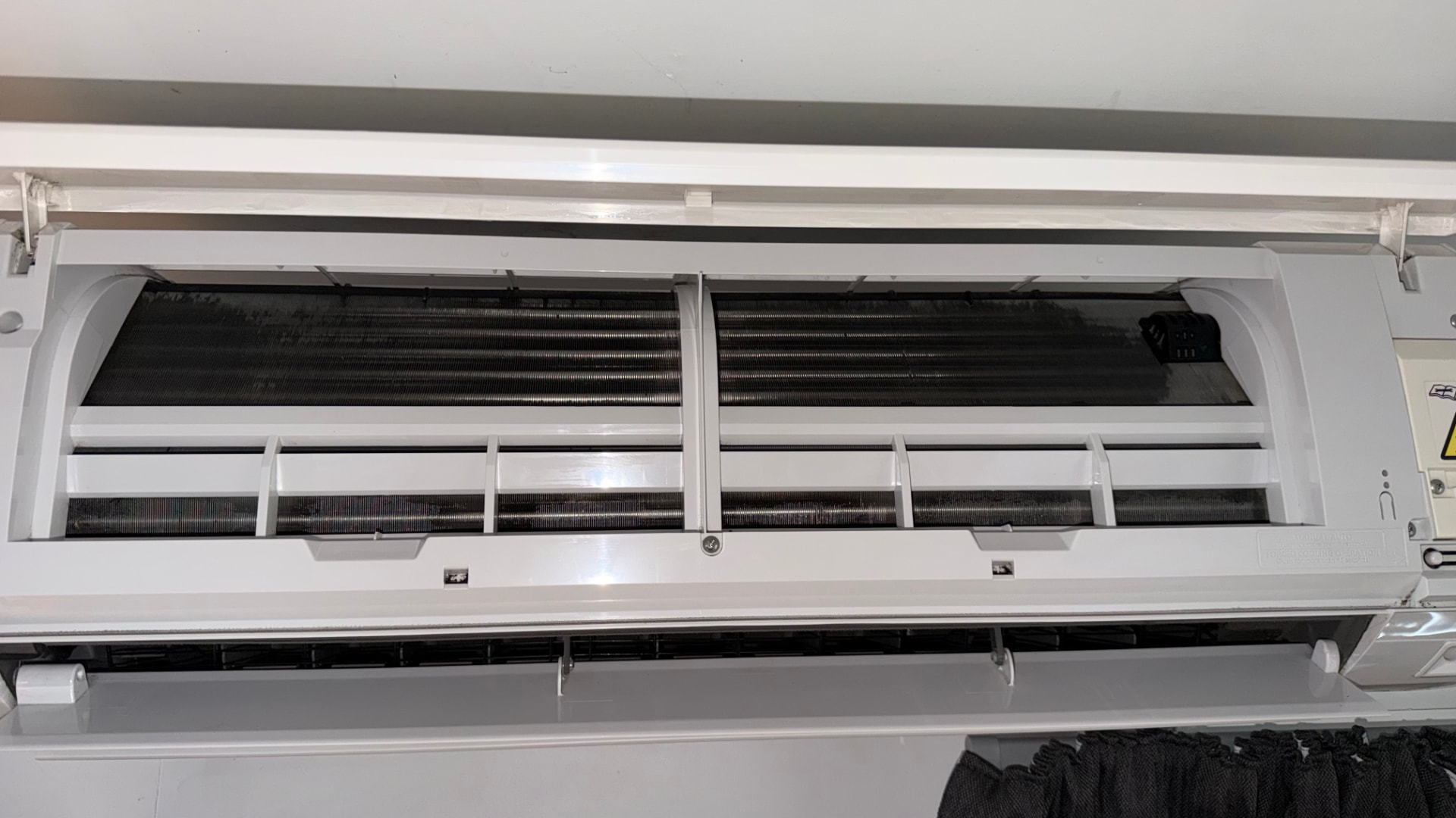 Detailed view of Mana Air heat pump cleaning work